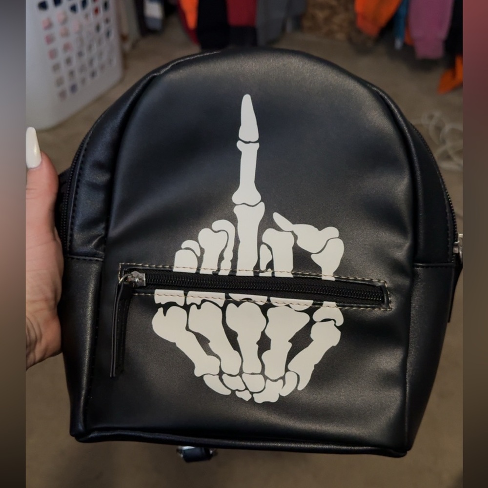 Middle finger backpack